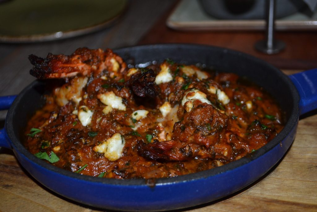 Jumbo Prawns soaked in tomato and feta sauce.