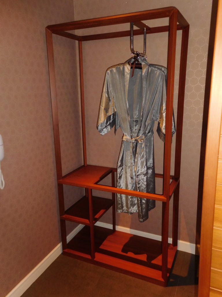 Swanky robe in the sauna and shower room area.