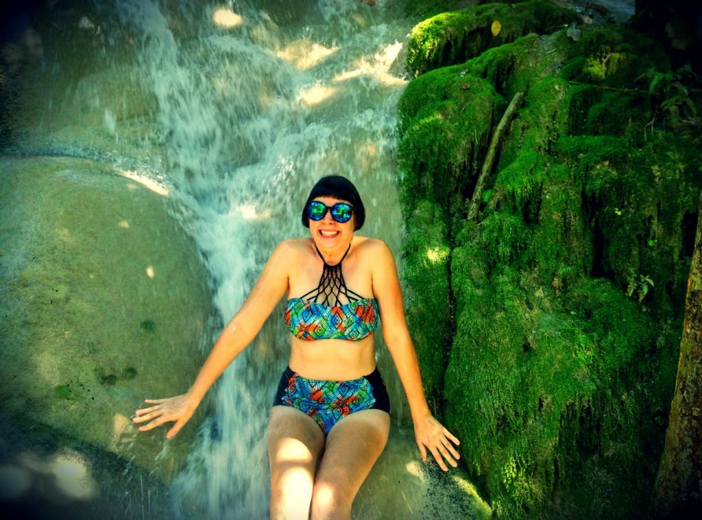 Teacake taking a shower at the sticky Waterfalls in Chiang Mai Thailand