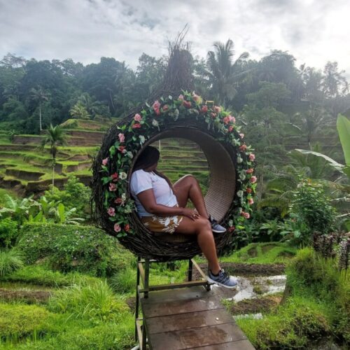 Myself overlooking the rice fields from a beautiful seating area during my Bali Indonesia trip. 
